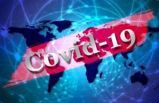 Graphic - Covid-19 with globe behind it