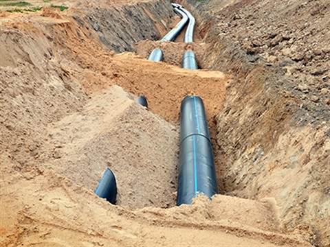 A pipe running in the ground