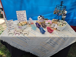 Table with soap, soap dish, wash cloths