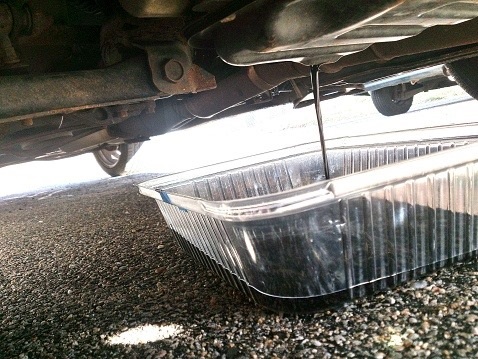 Oil draining out of car