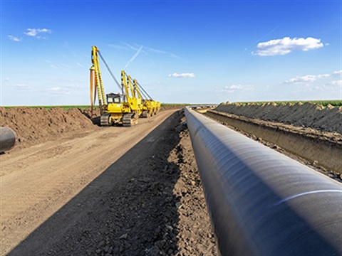 Pipelines running along construction equipment