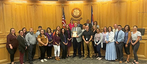 Adult Protective Services staff with Board of Commissioners