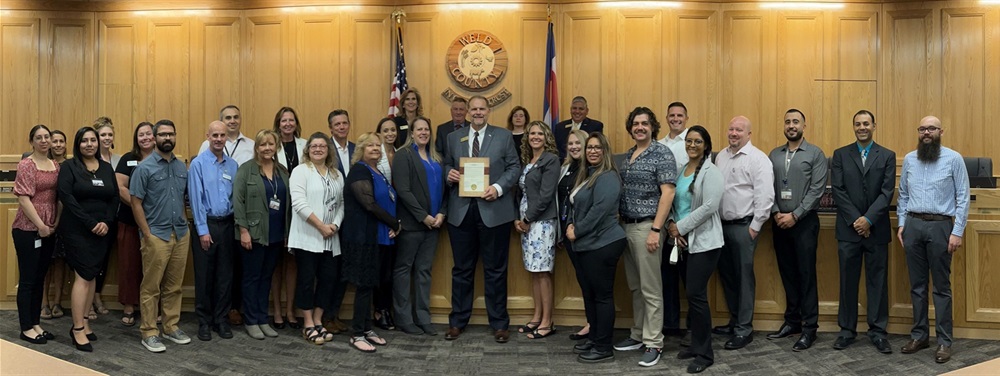 Employment Services of Weld County staff with BOCC