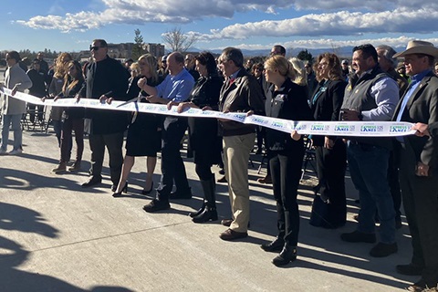 A group of officials at the north I-25 Express Lanes ribbon-cutting event.