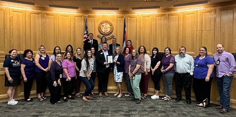Adult Protection Services staff with Board of Commissioners