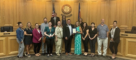 Weld County Child Support staff with board of commissioners.